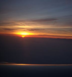 Sunrise from the Wing of a Plane