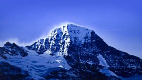 The Breithorn with jet by Tony Lloyd